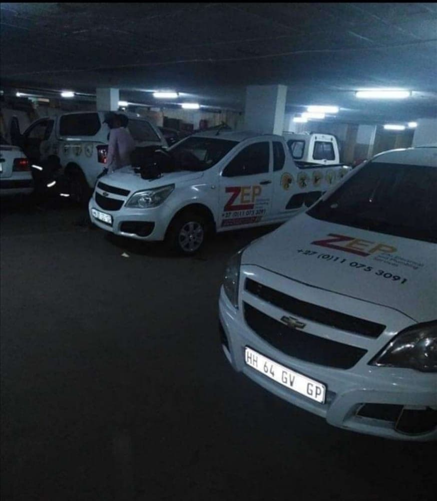 ZEPS branded bakkies with office number 011 075 3091