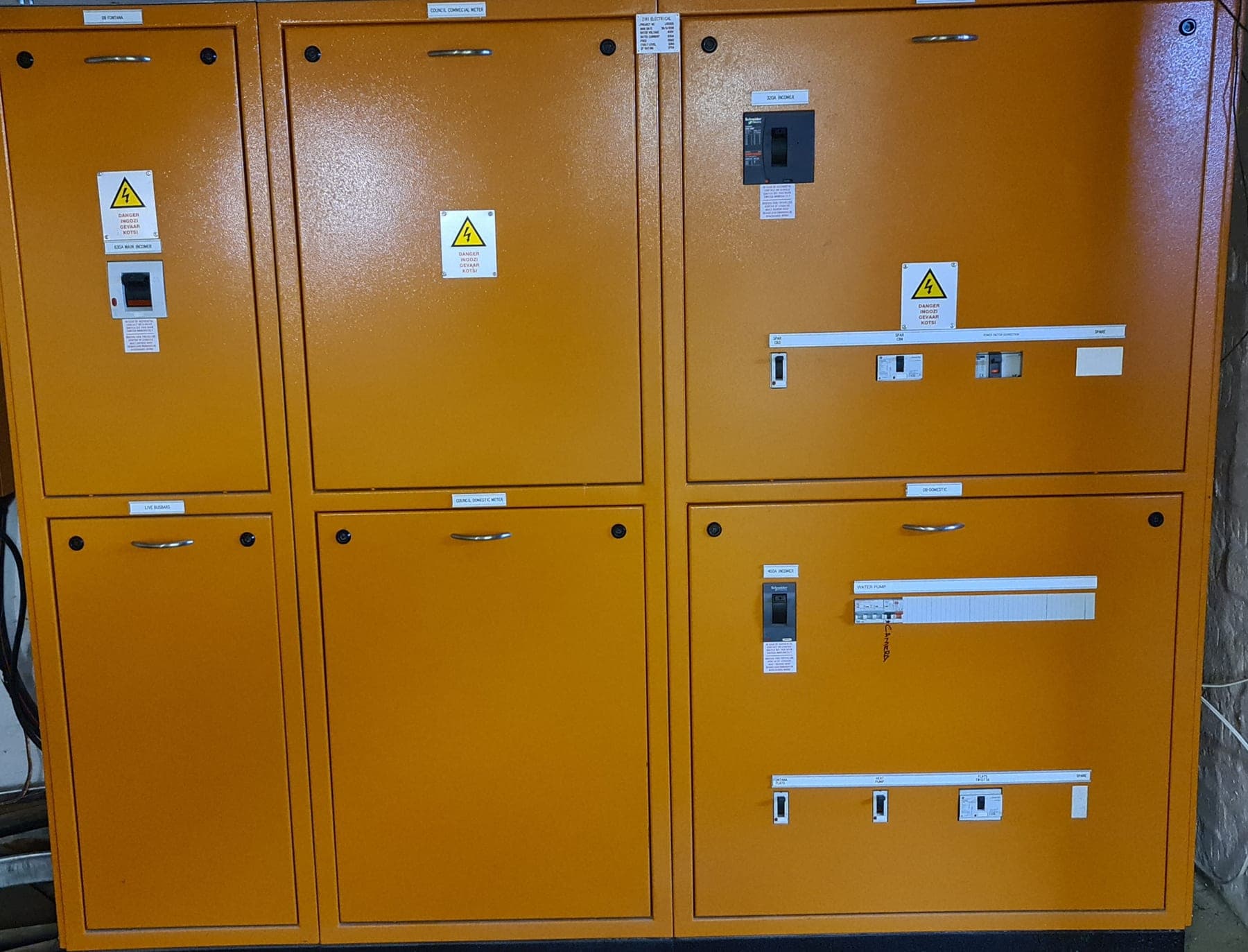 Orange commercial distribution board installed by ZEPS Electrical