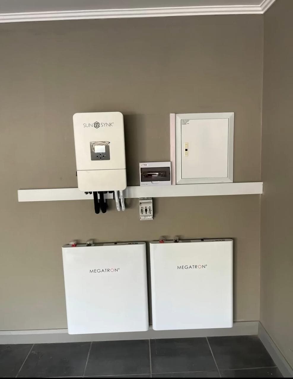 SunSynk inverter and Megatron battery wall installed by ZEPS